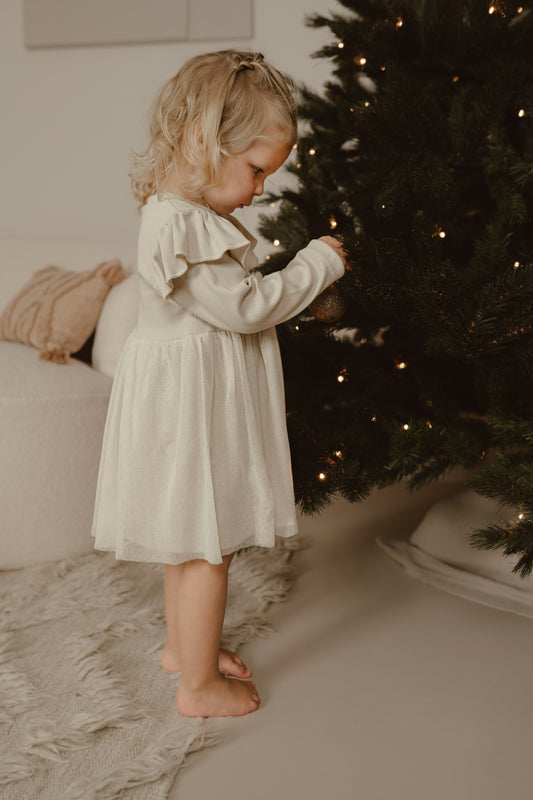 Kerstkleding voor baby's: comfortabele outfits voor de feestdagen